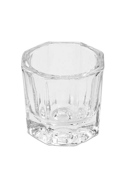 Closeup of a high-quality SuperNail Glass Dappen Dish lay in and isolated in white color background