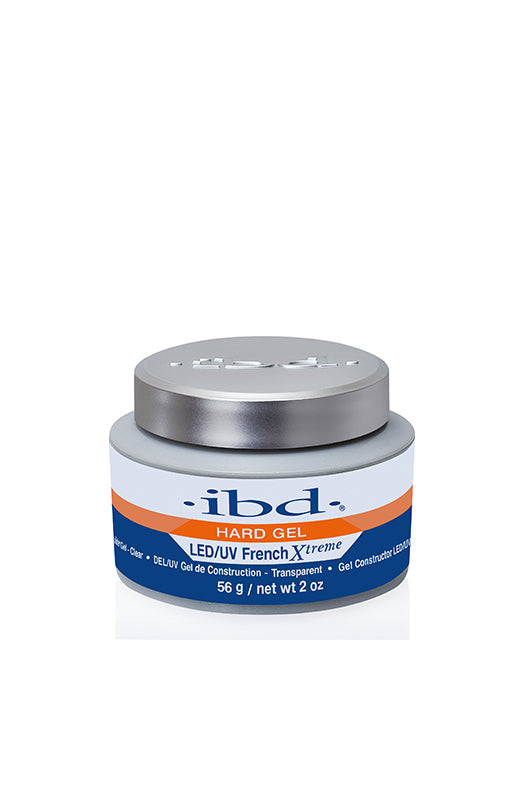 A 2 ounce grey plastic tub filled with ibd LED/UV French Xtreme Clear nail gel featuring a silver cover cap