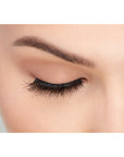 A model with a close right eye wearing Ardel Double Wispies showing its natural lash look