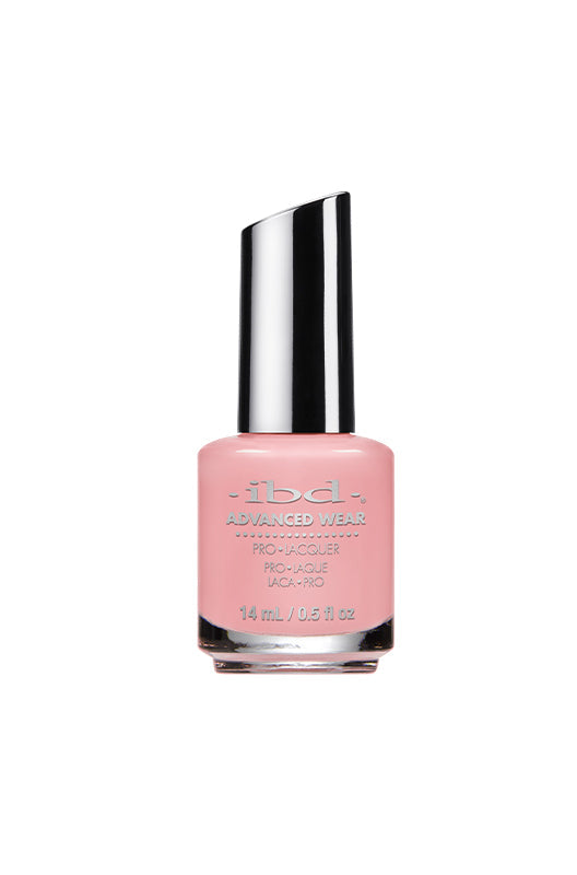 IBD Advanced Wear lacquer duo Motel Me About It, a soft petal pink crème that’s delicate, romantic, and timeless.