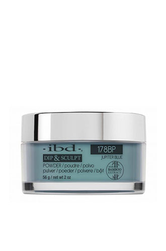 Front view of a 2 ounce transparent glass container of ibd Dip & Sculpt Jupiter Blue with metallic silver cap