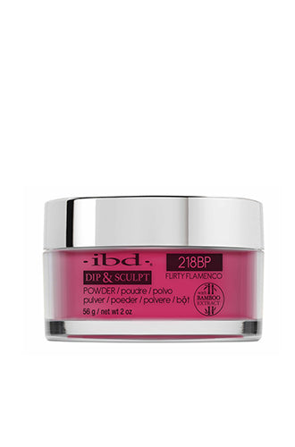 ibd Dip & Sculpt Flirty Flamenco in a 2-ounce clear glass tub with a metallic silver cap