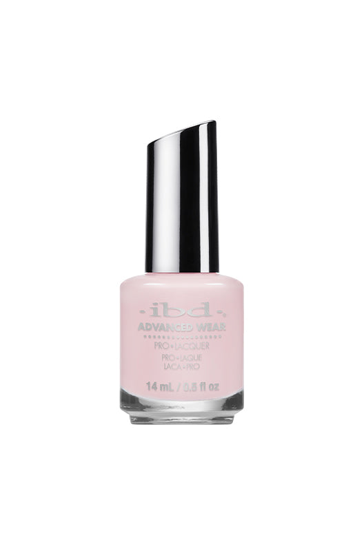 IBD Advanced Wear in Froze, a soft, pale pink that offers a clean and delicate manicure for any occasion.