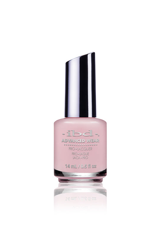 IBD Advanced Wear polish in I'm No Damsel, a cool-toned baby pink ideal for soft, romantic nail looks.
