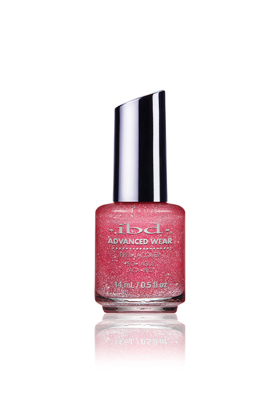 IBD Advanced Wear polish in Debutante Ball, a sparkling ruby pink infused with holographic glitter for high-shine, party-ready nails.