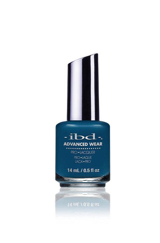 IBD "Hippie Dippie" Nail Polish Bottle, a rich teal-blue shade with a sophisticated glossy finish.