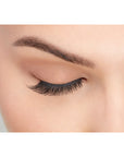 A model wearing Ardell's Faux mink 811 with close right eye showing its finely tapered end & the flared, winged out style