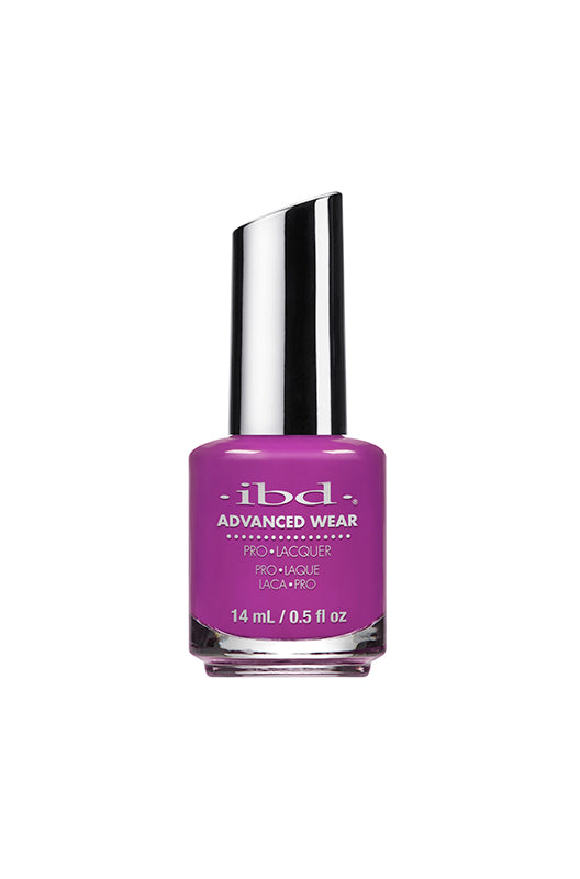 IBD Advanced Wear Lacquer in "Magic Genie," a bold purple nail polish with a creamy, high-gloss finish.