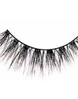 A macro shot of Fauxmink Demi Wispie lashes showing their medium volume & length, flared, crisscross, feathered & curl style