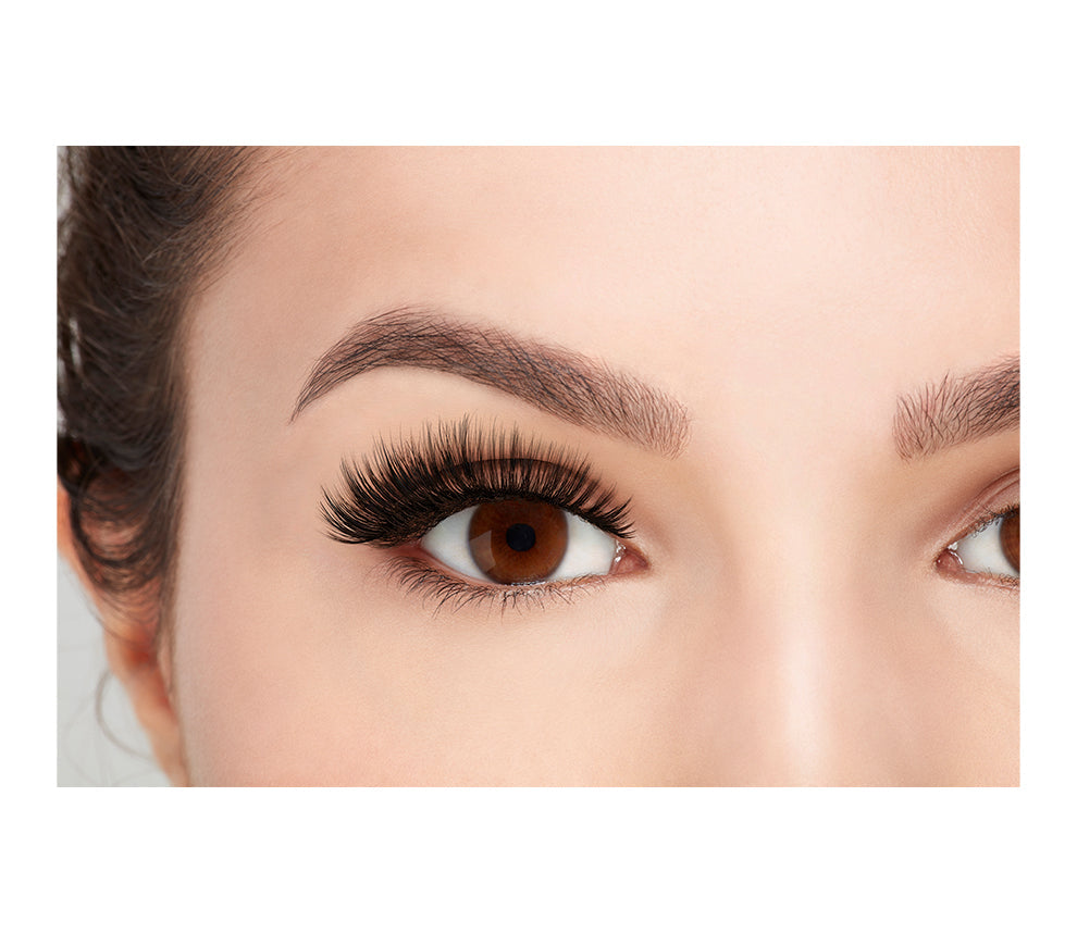 A model with opened eye wearing the Ardell 3D Faux Mink 854 eyelash showing how it looks like when worn on a frontal view.