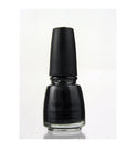A sphere with black beach sand texture nail polish sample color swatch lay on a plain scene