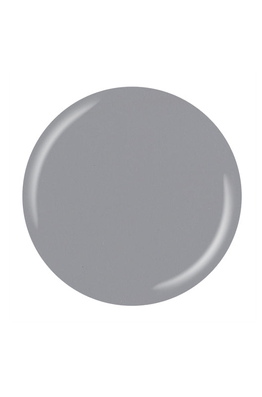 A circular shape of China Glaze lacquer sample swatch featuring its gray hue