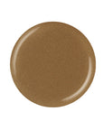 Shimmery gold circle nail polish sample color swatch isolated in white setting