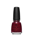 Expansive view of 0.5-ml capped China Glaze Kiss and Spell nail color variant