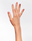 A woman hand with Ardell nail color