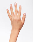 A woman's hand with nail lacquer.