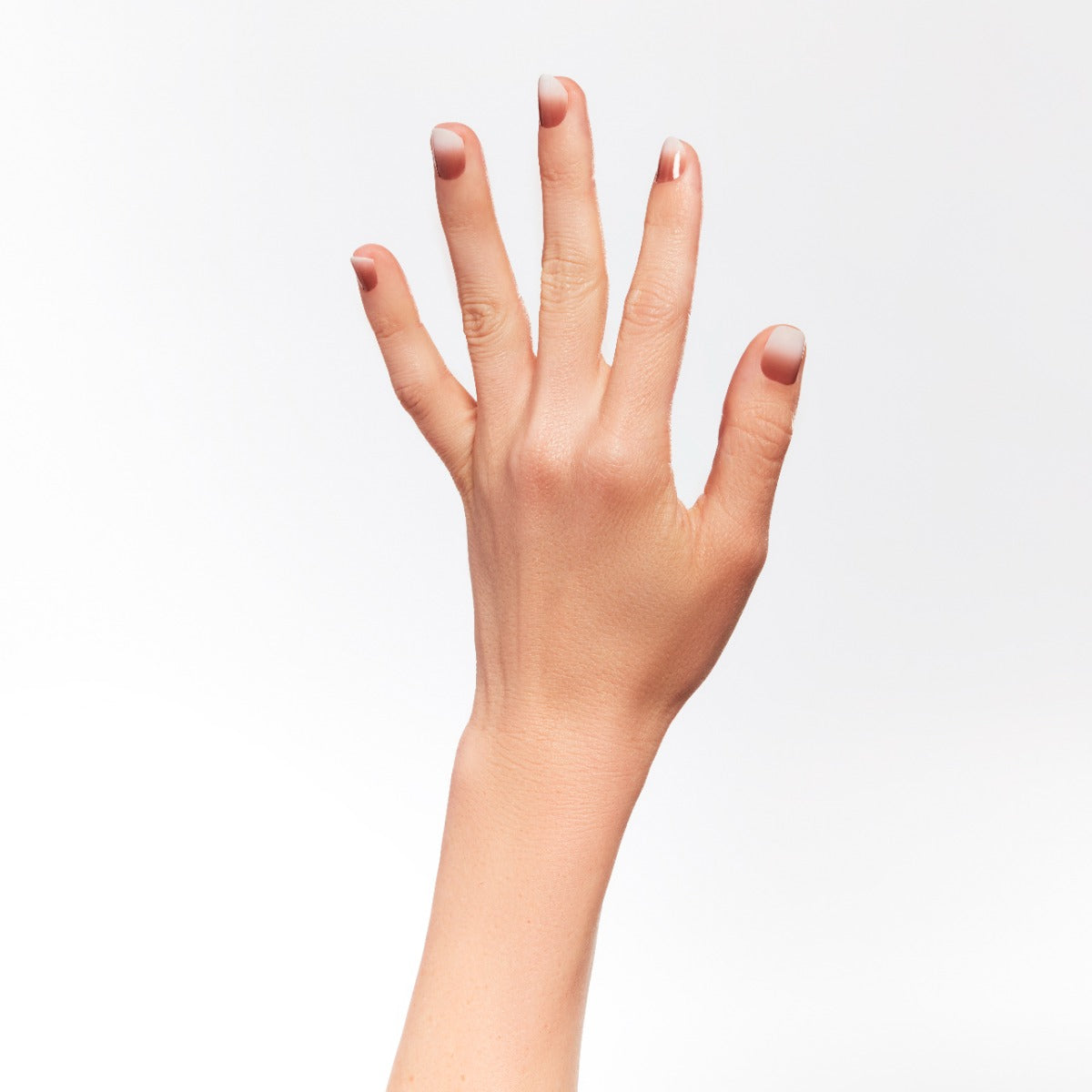 A woman hand using Ardell Nail products