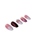Set of Ardell Nail Addict Sparkling Tiara artificial nails in a slanted position isolated in white color background