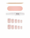 A set of classic pink French tip square press-on nails with nail glue and accessories for a timeless manicure.