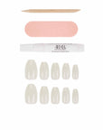 A set of classic natural ballerina press-on nails with nail glue, buffer, and cuticle stick for a natural, polished look.