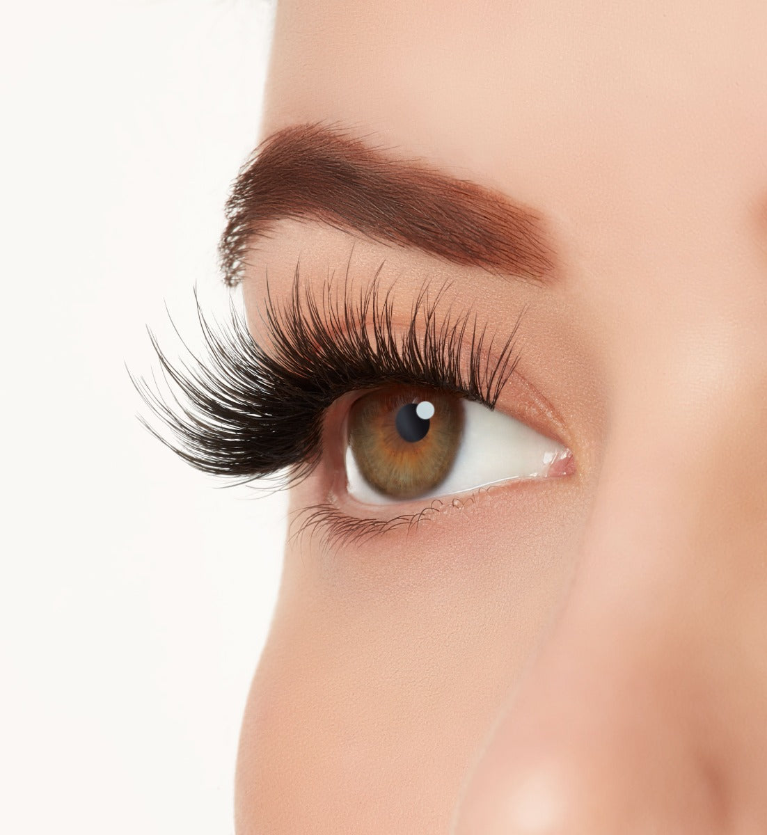 Side view close-up of a model's open right eye wearing Ardell Mega Volume 261 faux eye lashes