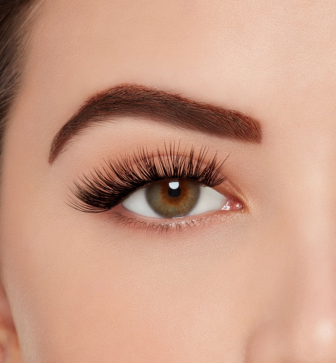 Close-up of a model's open right eye wearing Ardell Mega Volume 263 false eye lash
