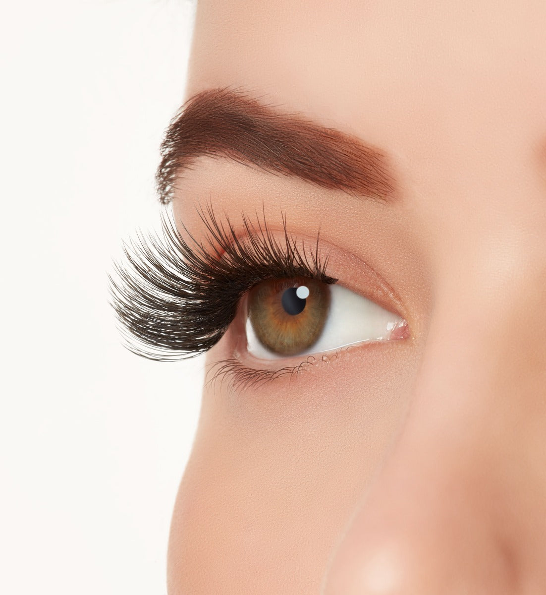 Angled close-up of a model's open right eye wearing Ardell Mega Volume 263 eye lashes