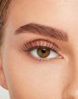 Close-up of a model's open right eye wearing an Ardell Lift Effect 740 false lash