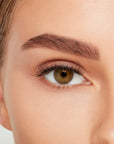 Close-up of a model's open right eye wearing an Ardell Lift Effect 742 false lash