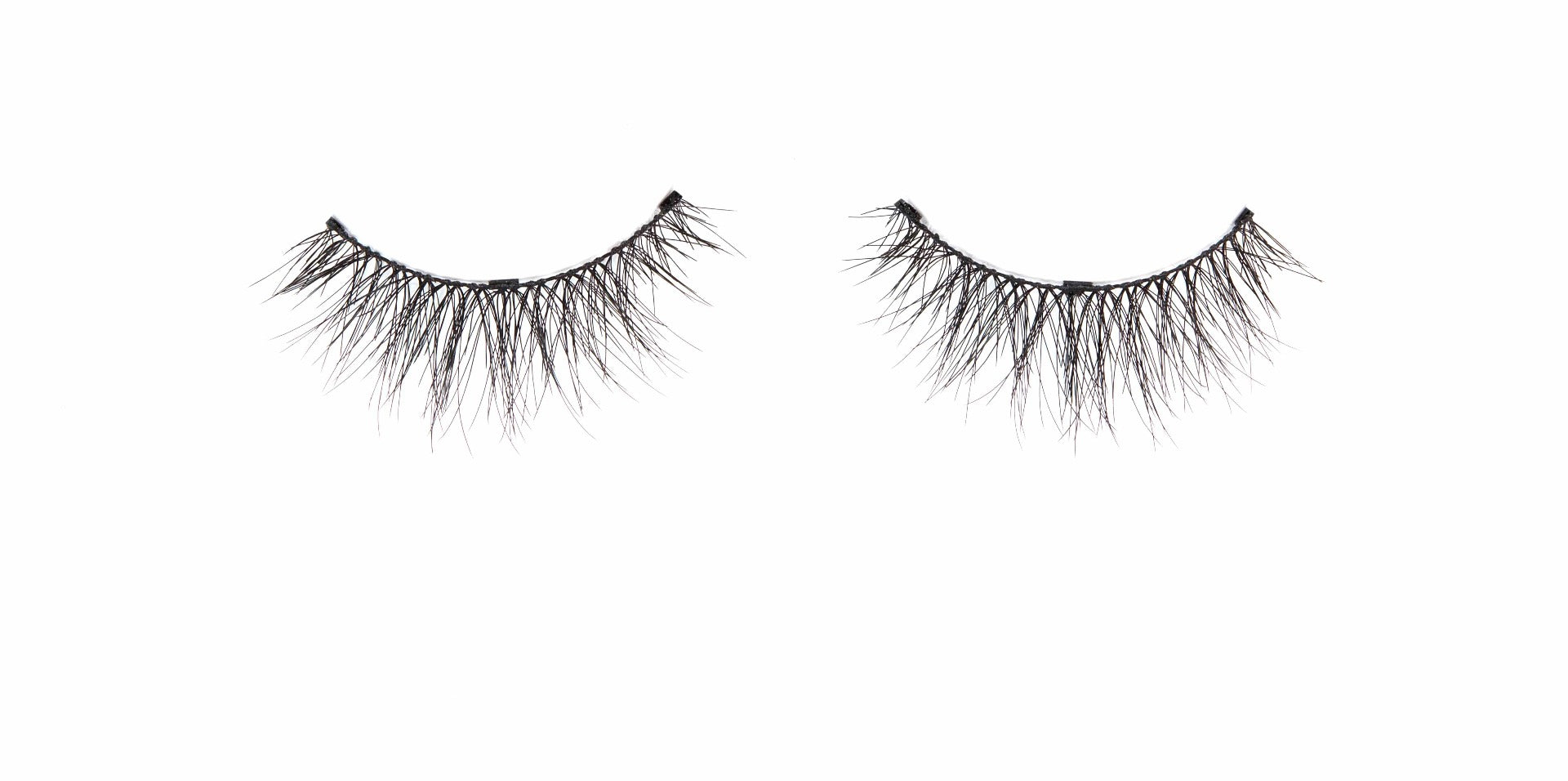 A pair of floating Ardell Beauty Magnetic Naked Lashes 421 false lashes for the left & right eyes on white color background