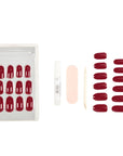 A set of glossy deep red Sip of Wine colored press-on nails with nail glue, file, and applicator for a salon-perfect manicure at home.