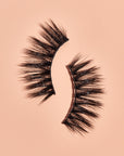1 pair of lashes on a pink background