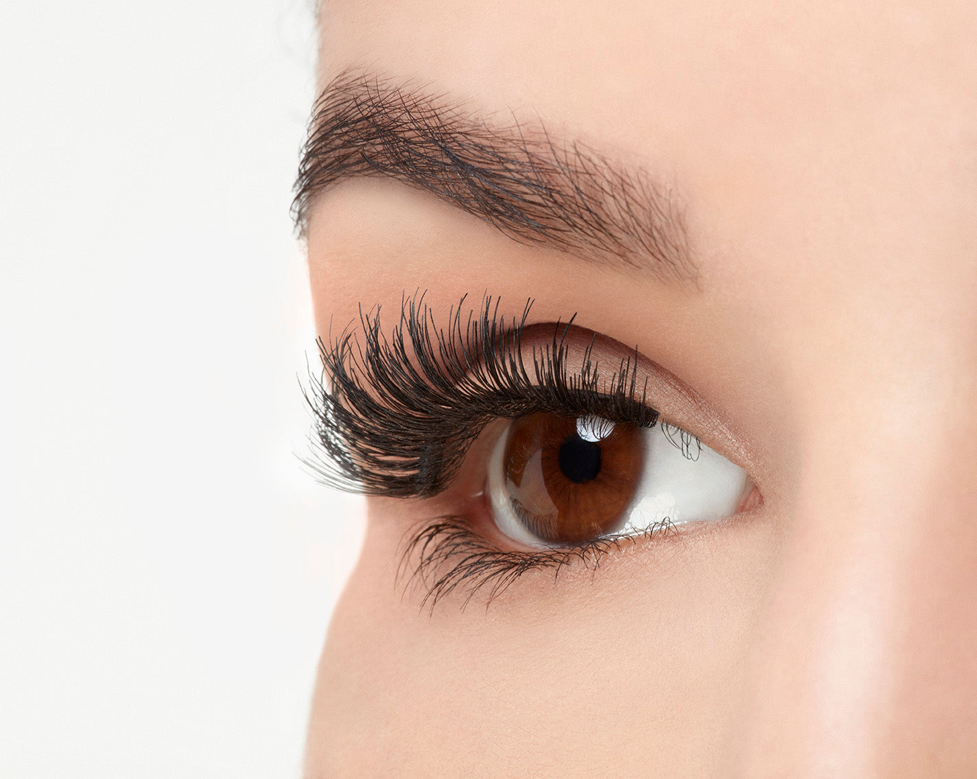 A model wearing Ardell Studio Effects 232 showing its enhanced winged effect and the undetectable lash band