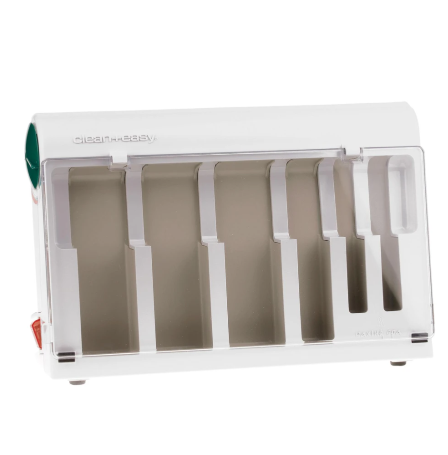 3D perspective of an empty Clean + Easy Waxing Spa Warmer for wax cartridges system kit