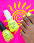 Top view of a nail hue with dark skin tone toenails showing its nail color