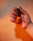 Hand model image of shade Bring the Heat, a silver metallic.
