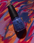 Stylized image of shade Night Dunes, a gold brown with gold shimmer.