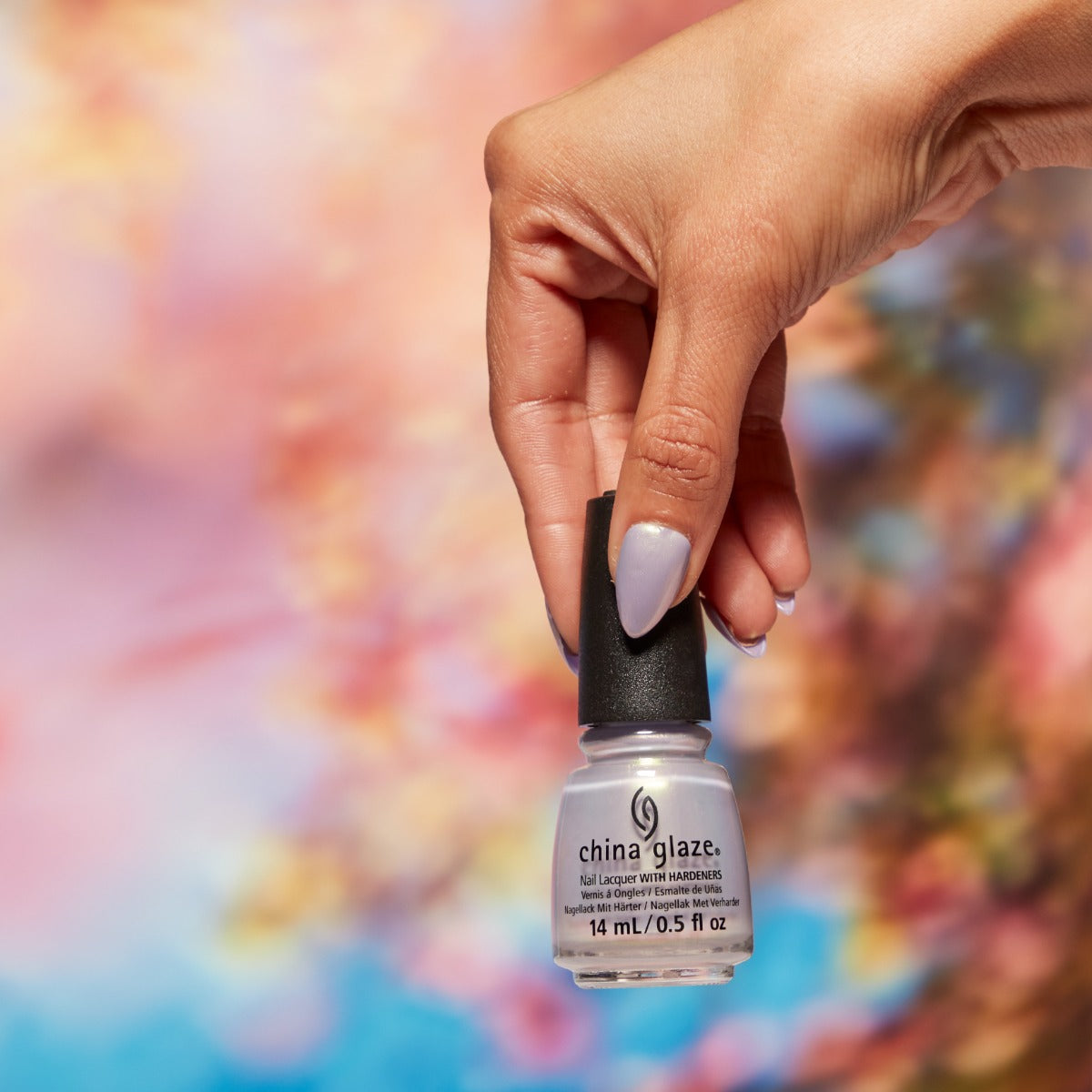 Stylized image of China Glaze Nail Lacquer, Lavender Haze bottle