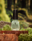 Stylized image with China Glaze Nail Lacquer, Mystic Garden bottle