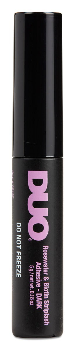 A close-up of DUO Rosewater & Biotin Striplash Adhesive bottle in dark formula, known for its gentle and nourishing hold.