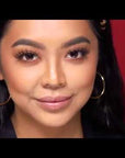 Model Wearing Ardell Lashes & Brows – Woman with voluminous false lashes and defined brows using Ardell products.