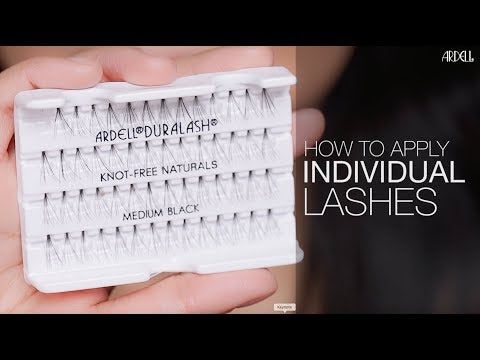 Model holding Ardell Duralash Knot-Free Naturals Medium Black individual lashes with 'How to Apply Individual Lashes' text overlay.