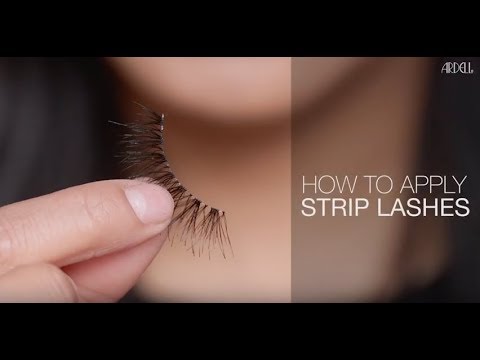 Close-up of hand holding Ardell strip lashes with tutorial text 'How to Apply Strip Lashes'.