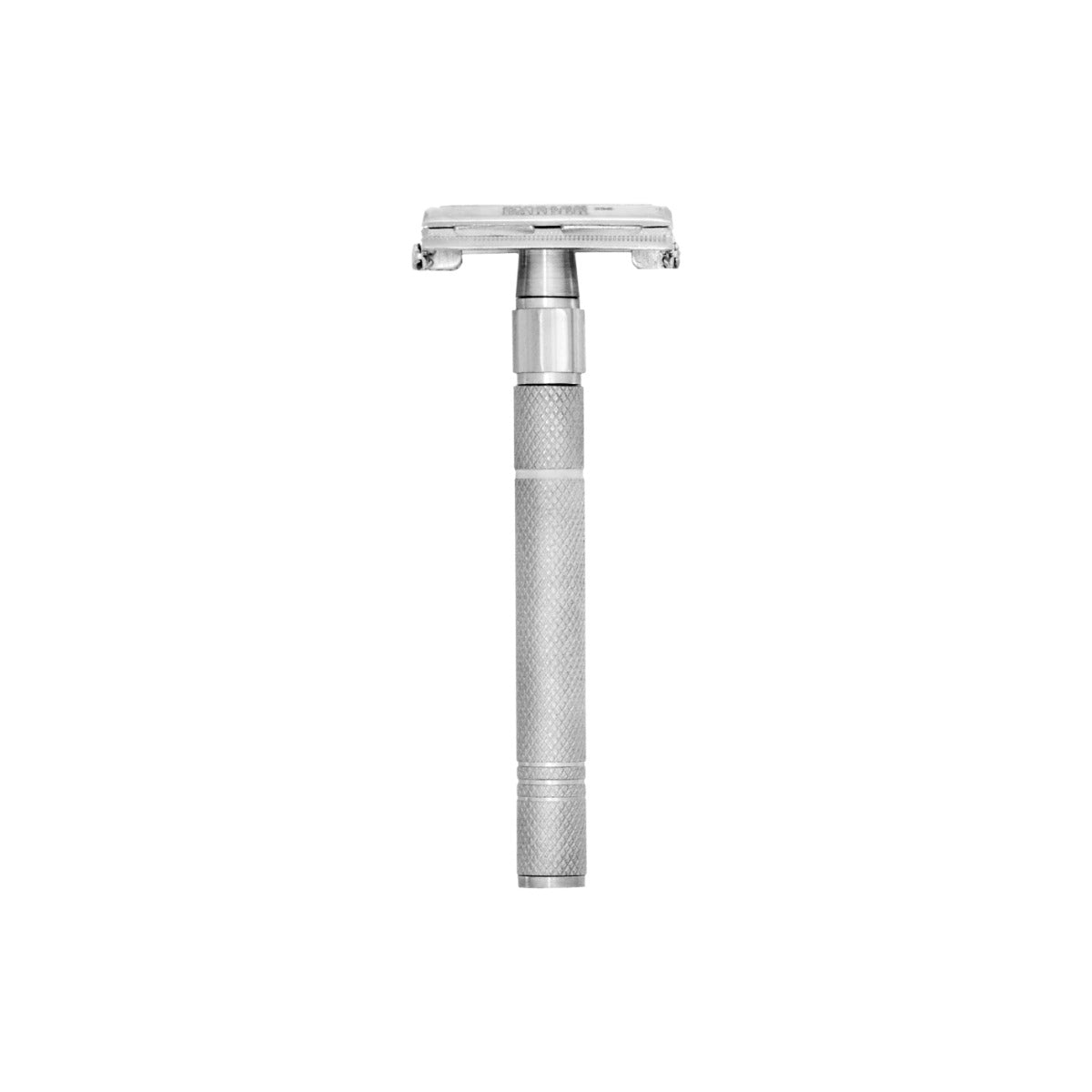 Close-up view of the silver-handled butterfly safety razor for a classic shave.