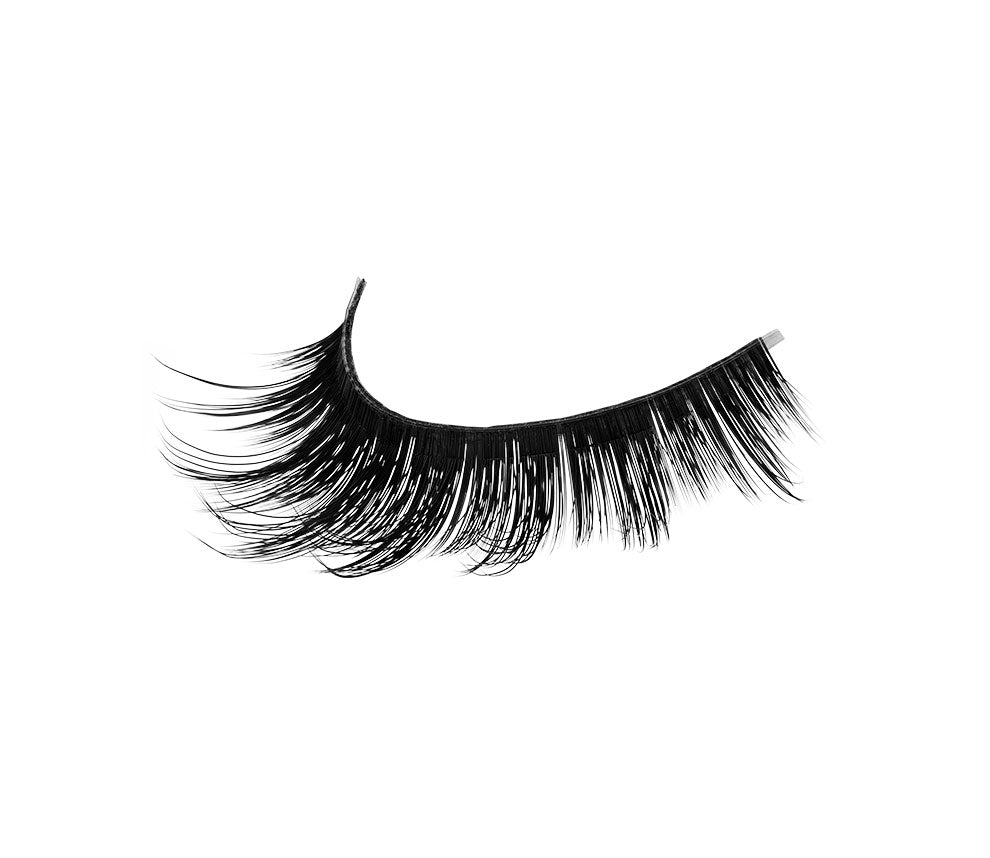 Angled close-up of an Ardell Faux Mink 810 false lash for the right eye featuring clustered lash fibers