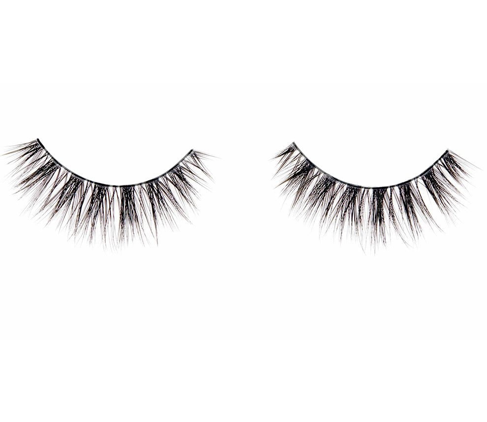 A closeup shot of Ardell Fauxmink Wispies&#39; pair showing its actual look, length, volume, and design on a white background