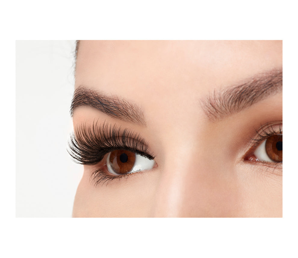 A model wearing Ardell 3D Faux Mink 853 inside view emphasizing the curly, flared & natural lash look