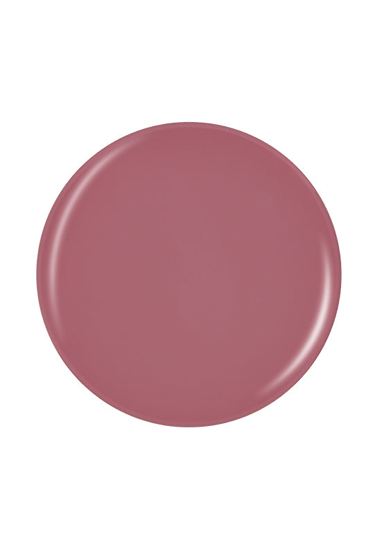 Glossy pale pink circle nail polish sample color swatch isolated in white background