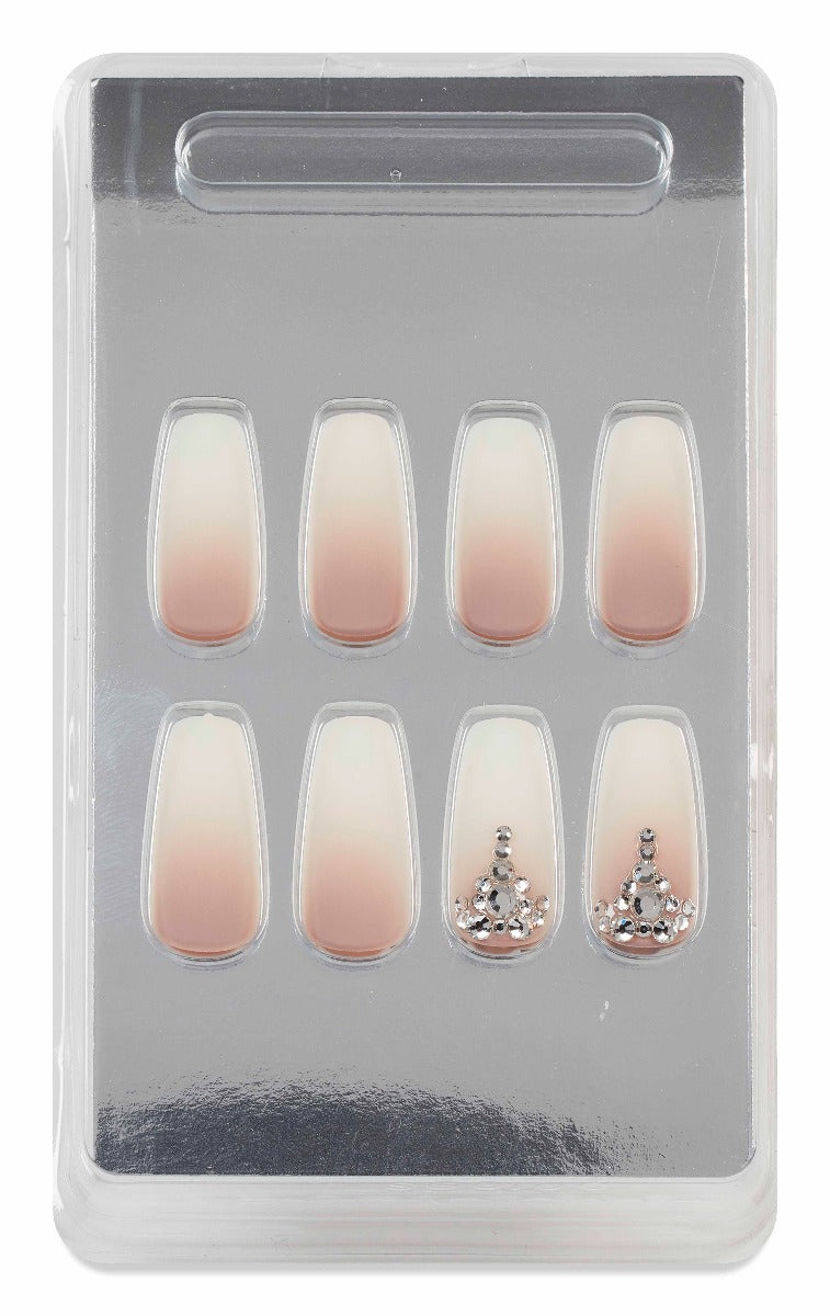 Ombré gradient press-on nails with rhinestone embellishments, neatly packaged in a clear display case.