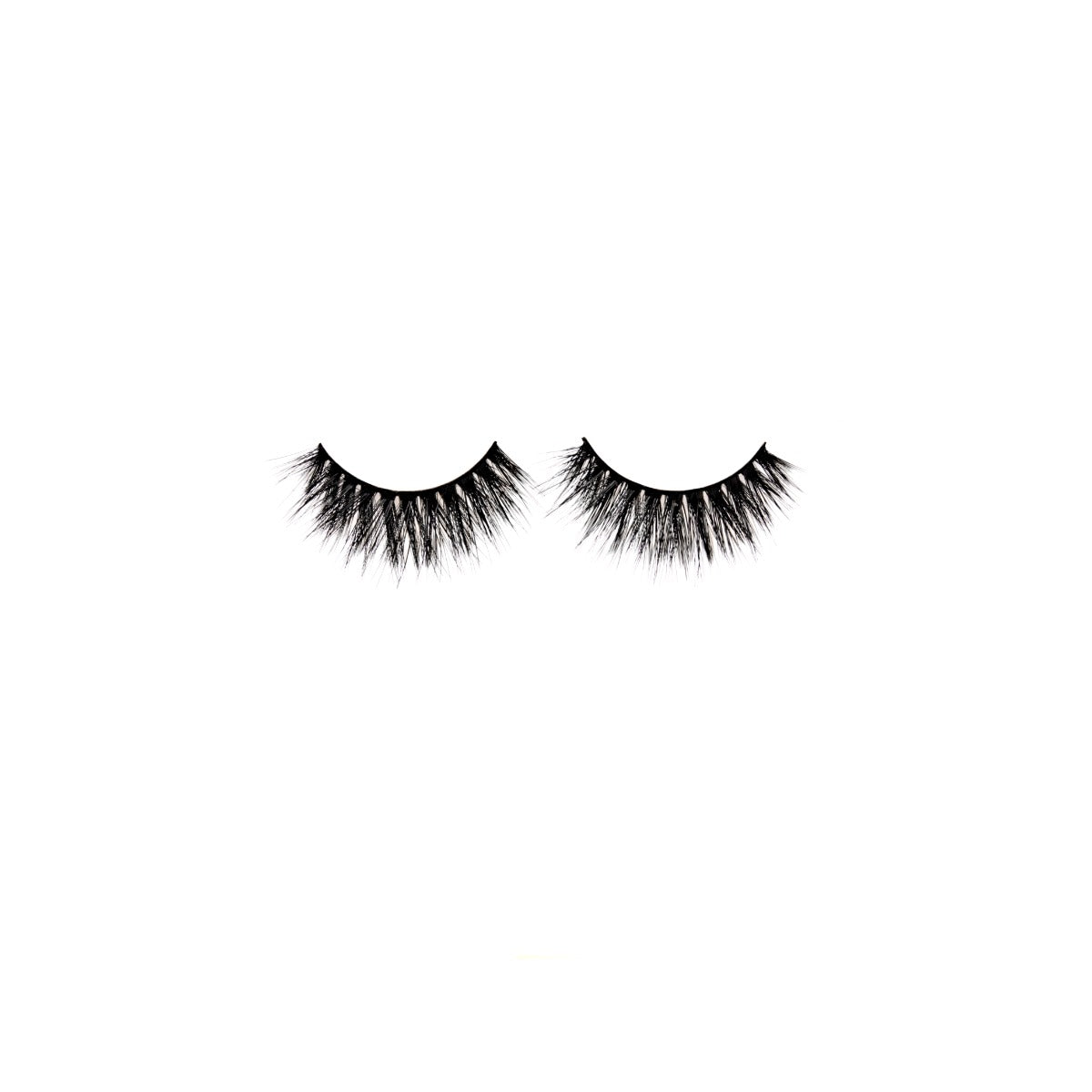 1 pair of lashes on a white background 
